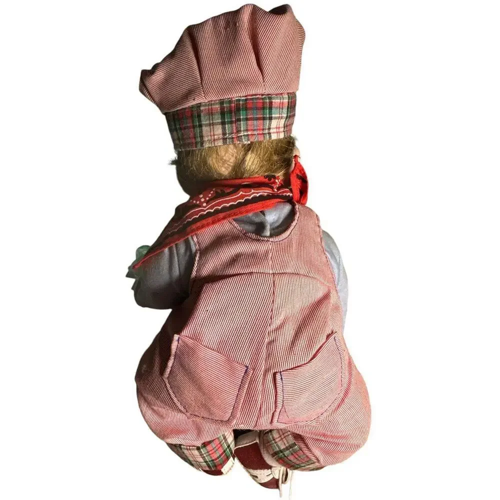 Doll Vintage from the 1990s Materials: Bisque Porcelain, Fabric, Wood About this